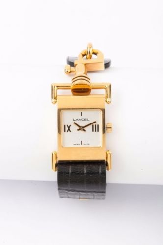 LANCEL Montre de dame en métal doré